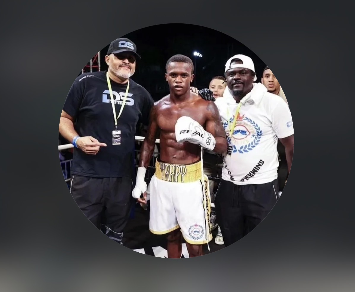 Coach Smitty Francis with Derik Santos and fighter Trapp ringside